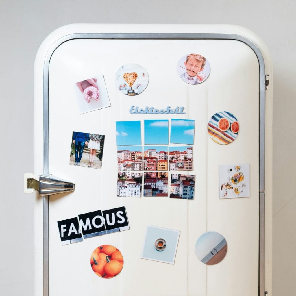 Refrigerator door with colorful magnets in a Miami home